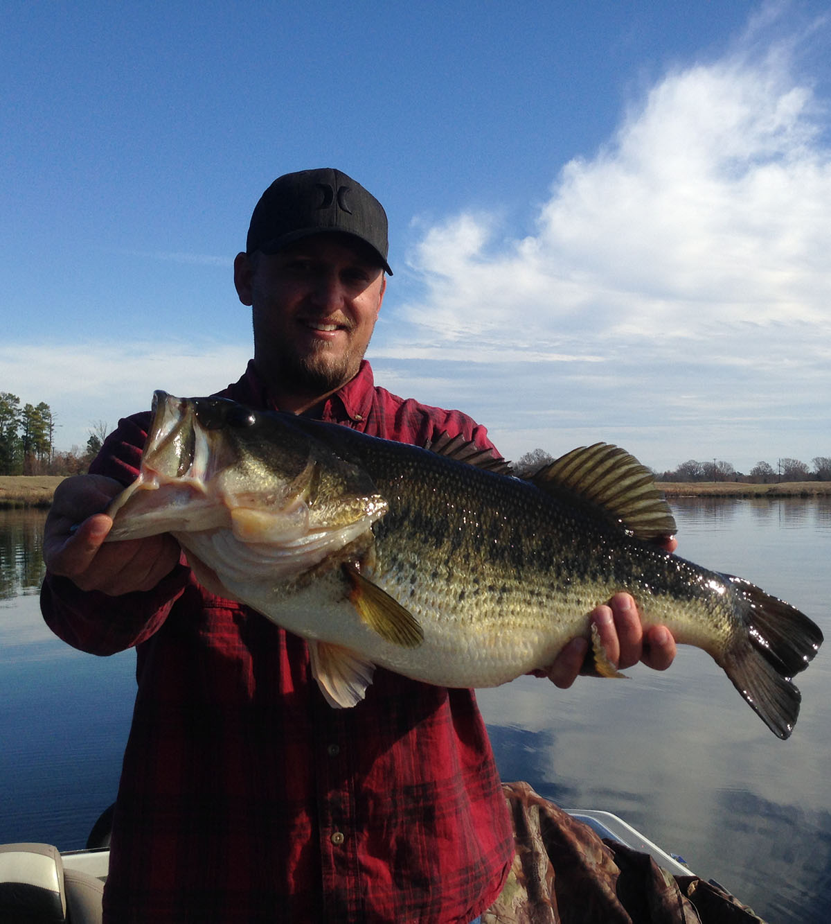 Fisherman with bass