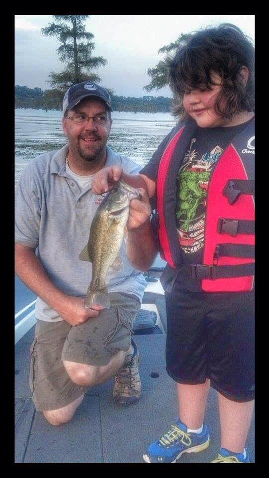 Fisherman with bass